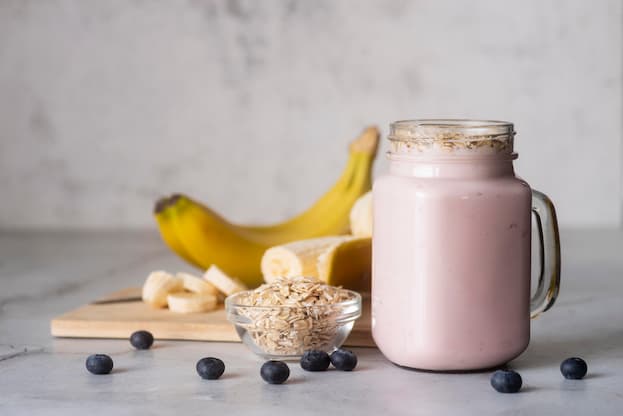 Protein shake with banana and blue berries